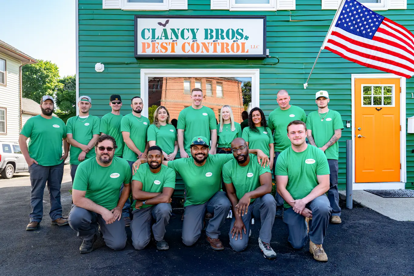 Clancy Brothers Pest Control team in front of building